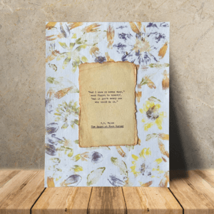 Art made using pigment from real plants as a backdrop. Atop, on handmade cotton paper, is a hand typed quote from A. A. Milne's book The House at Pooh Corner.