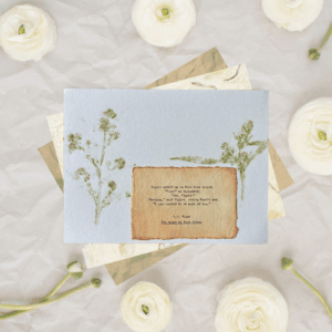 Art made using pigment from real plants as a backdrop. Atop, on handmade cotton paper, is a hand typed quote from A. A. Milne's book The House at Pooh Corner.