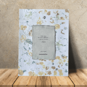 Art made using pigment from real plants as a backdrop. Atop, on handmade cotton paper, is a hand typed quote from A. A. Milne's book Winnie-the-Pooh.
