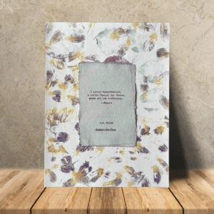 Art made using pigment from real plants as a backdrop. Atop, on handmade cotton paper, is a hand typed quote from A. A. Milne's book Winnie-the-Pooh.