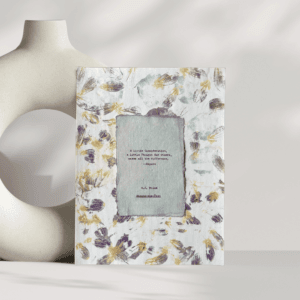 Art made using pigment from real plants as a backdrop. Atop, on handmade cotton paper, is a hand typed quote from A. A. Milne's book Winnie-the-Pooh.