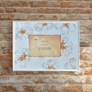 Art made using pigment from real plants as a backdrop. Atop, on handmade cotton paper, is the hand typed action verb, bloom, followed by its definition.