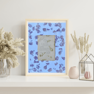 Art made using pigment from real plants depicting a floral backdrop behind a typewritten poem on handmade cotton paper.