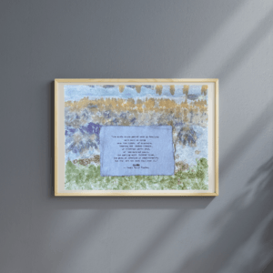 Art made using pigment from real plants depicting a backdrop inspired by the Blue Ridge Mountains with a typewritten quote from Henry David Thoreau's Walden on handmade cotton paper on top.