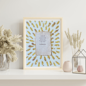 Art made using pigment from real plants depicting a floral backdrop with a typewritten quote from The Bhagavad-Gita on handmade cotton paper on top.