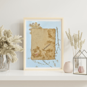 Art made using pigment from real plants depicting a floral backdrop behind a handmade cotton paper stamped with real flowers and with the typewritten text, "once upon a time...".