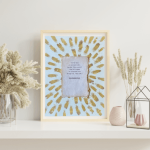Art made using pigment from real plants depicting a blue backdrop with a typewritten quote from The Bhagavad-Gita on handmade cotton paper on top.
