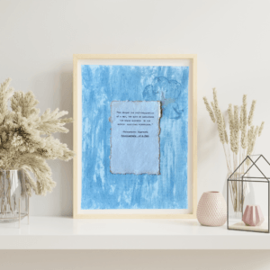 Art made using pigment from real plants depicting a blue backdrop with a typewritten quote by Paramahansa Yogananda on handmade cotton paper on top.