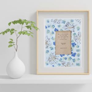 Mother's Voice quote from Poster Girls by Meredith Ritchie on handmade floral paper with violets and lenten roses