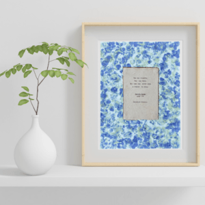 You May quote from Poster Girls by Meredith Ritchie on handmade floral paper with violets