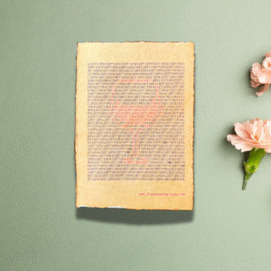 Handmade typewriter art on handmade, recycled, deckled-edged cotton paper. The repeated words “wine time” are hand typed in black on a typewriter. Red lettering forms a visual of a filled wine glass among the black text. The piece is displayed on a sage green background with light pink carnations arranged to the right. At the bottom of the art, the website “www.PlantsAreMyType.com” appears in red.